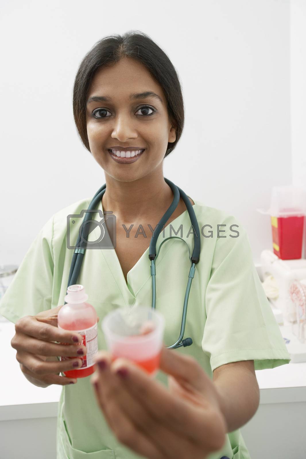 Royalty free image of Doctor giving medicine by moodboard