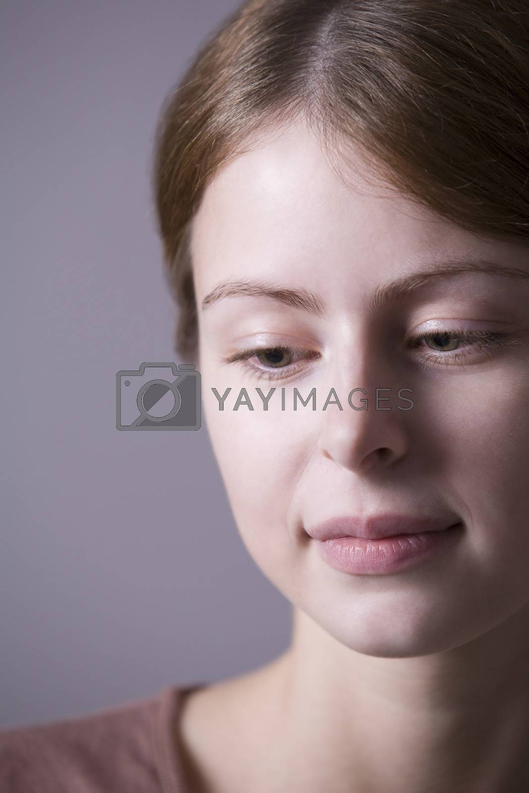 Royalty free image of Pensive young woman close-up  by moodboard
