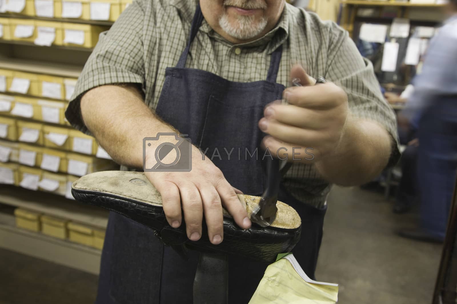 Royalty free image of Traditional shoemaker workshop by moodboard