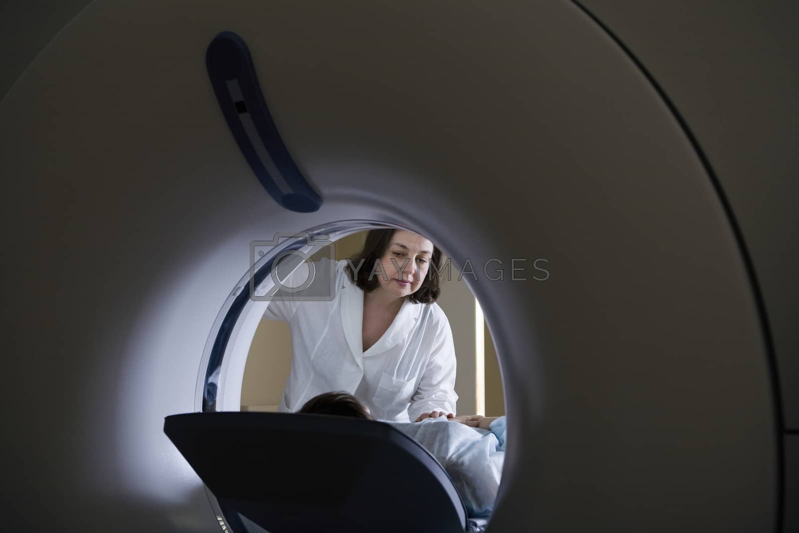 Royalty free image of Medical exam in CAT scan machine by moodboard