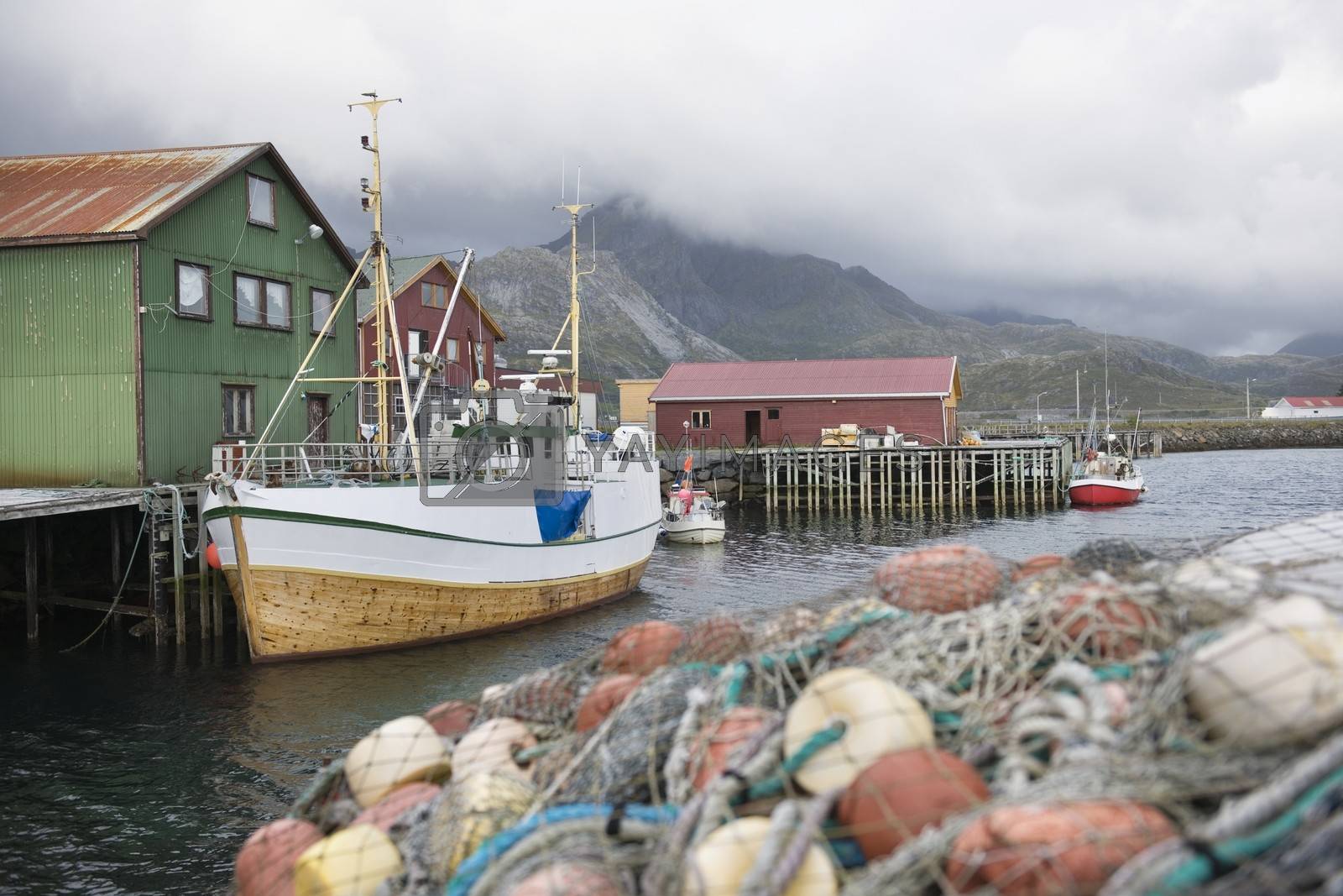 Royalty free image of Fishing boat moored on the Lofoten Islands Norway by moodboard