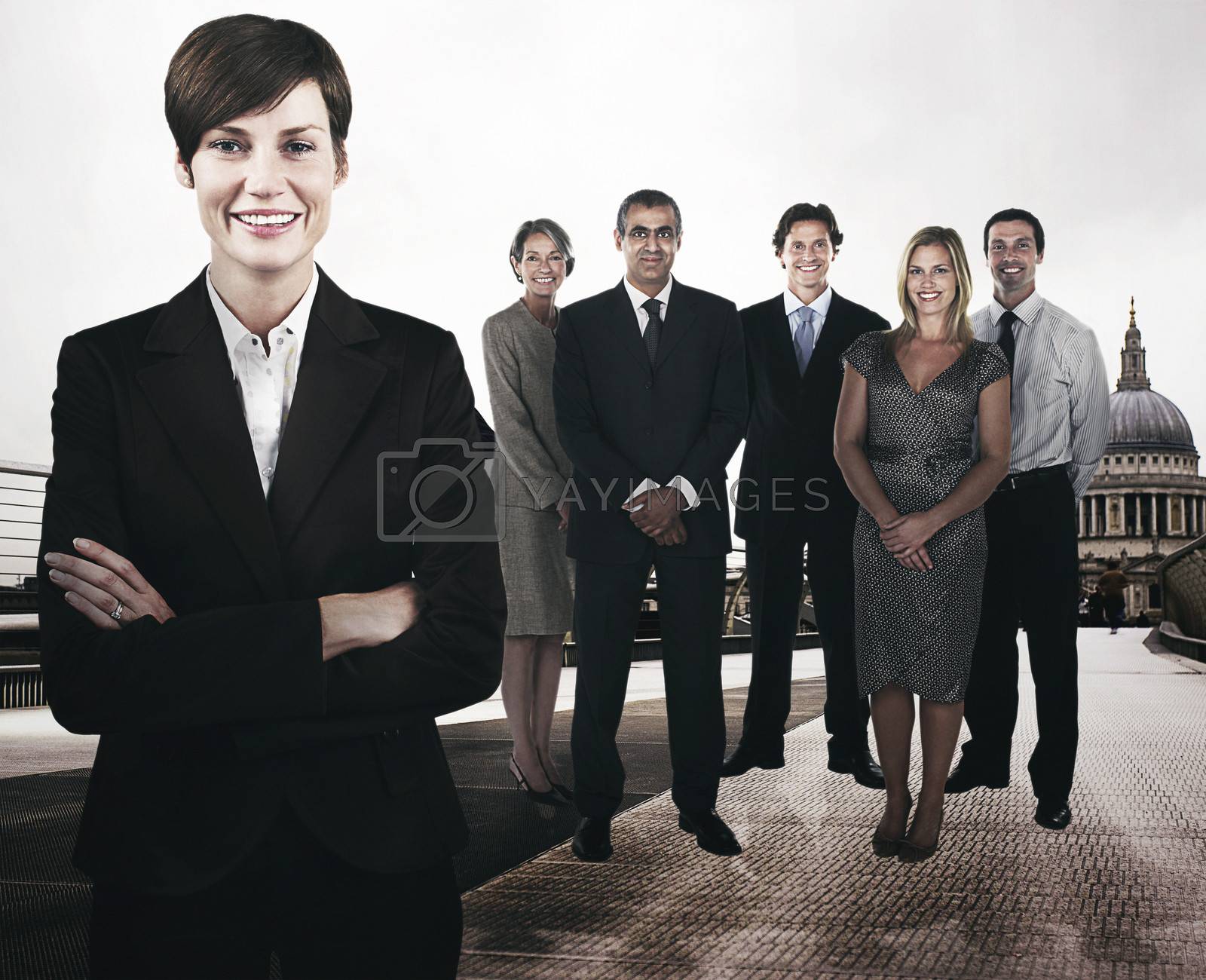 Royalty free image of Group of businesspeople on the Millennium Bridge in front of St. Paul's Cathedral by moodboard