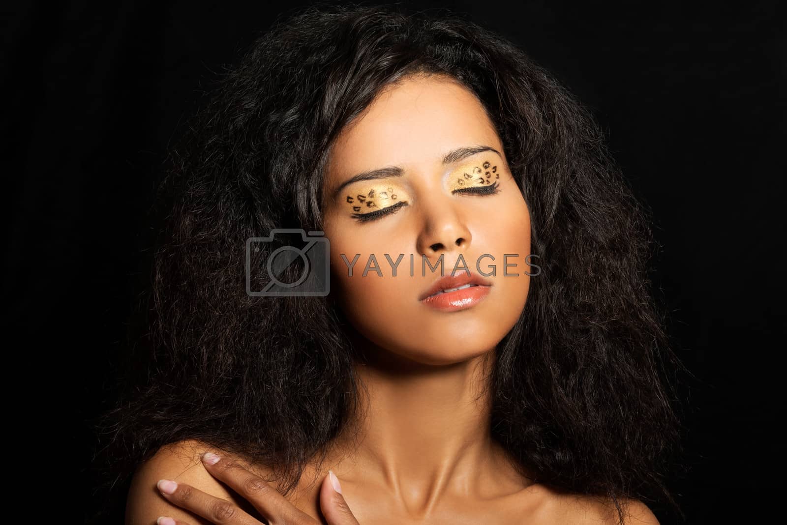 Royalty free image of Beautiful mulatto woman with tiger make up. by BDS
