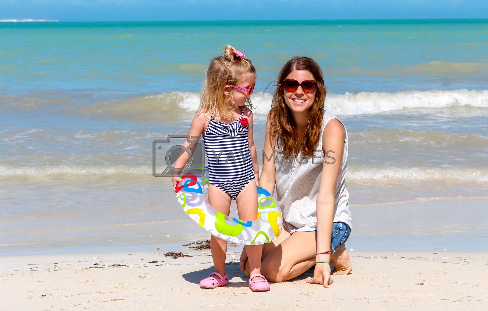 Royalty free image of Mom daughter beach fun by javiercorrea15