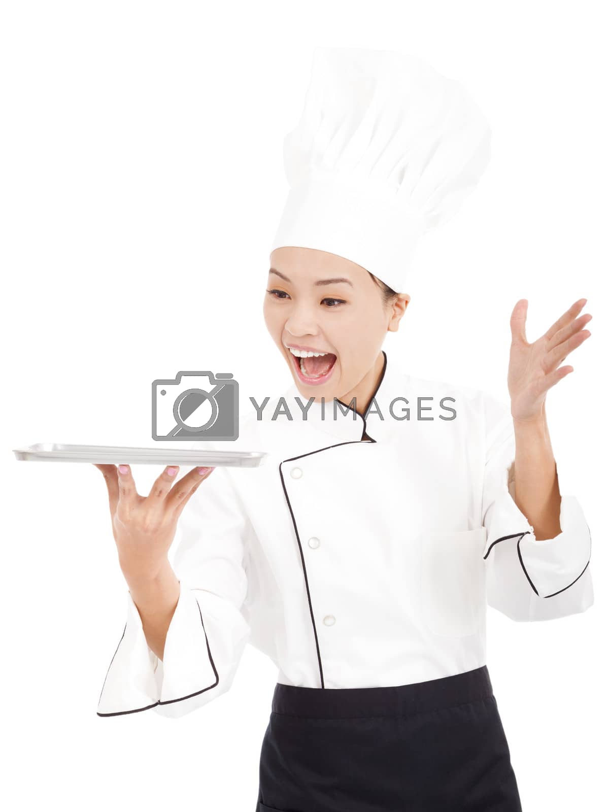 Royalty free image of amazing cook woman chef holding tray by tomwang