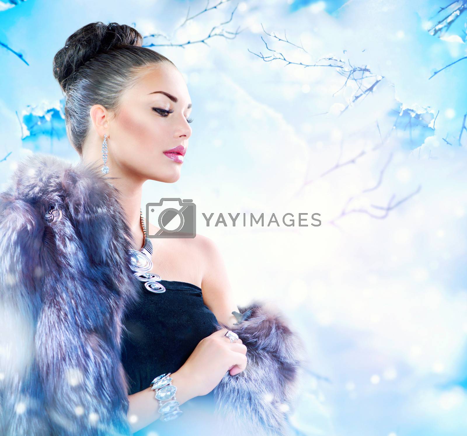 Royalty free image of Winter Woman in Luxury Fur Coat by SubbotinaA