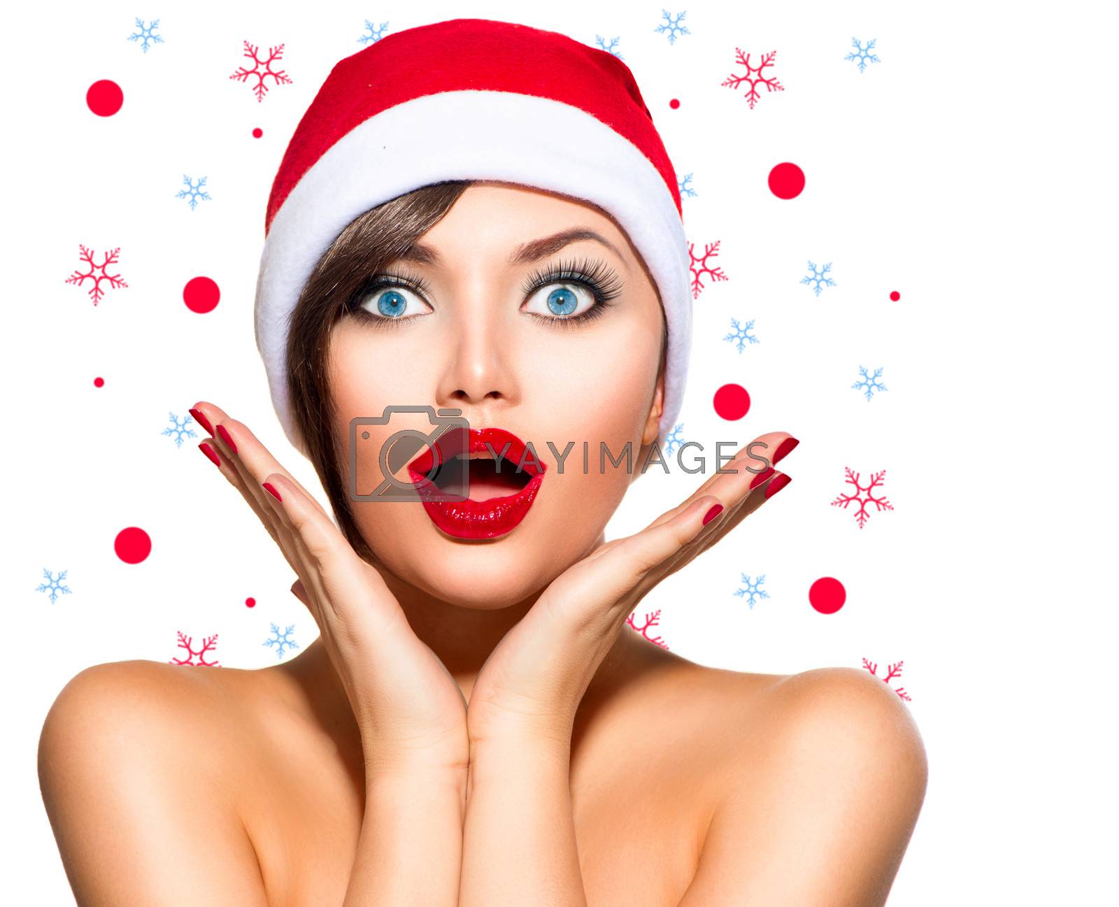 Royalty free image of Christmas Woman. Beauty Model Girl in Santa Hat by SubbotinaA