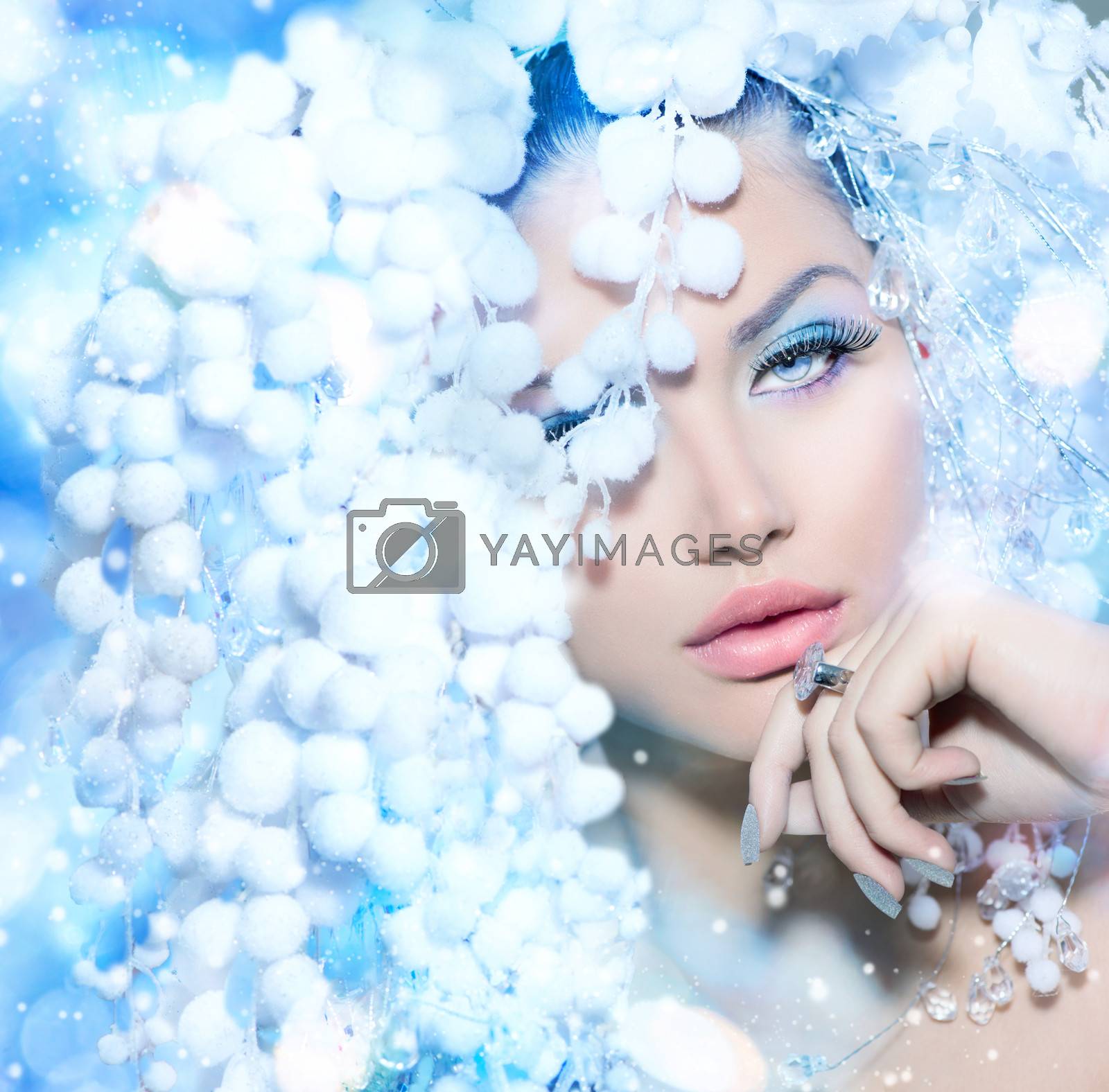 Royalty free image of Winter Beauty. Beautiful Fashion Model Girl with Snow Hair style by SubbotinaA