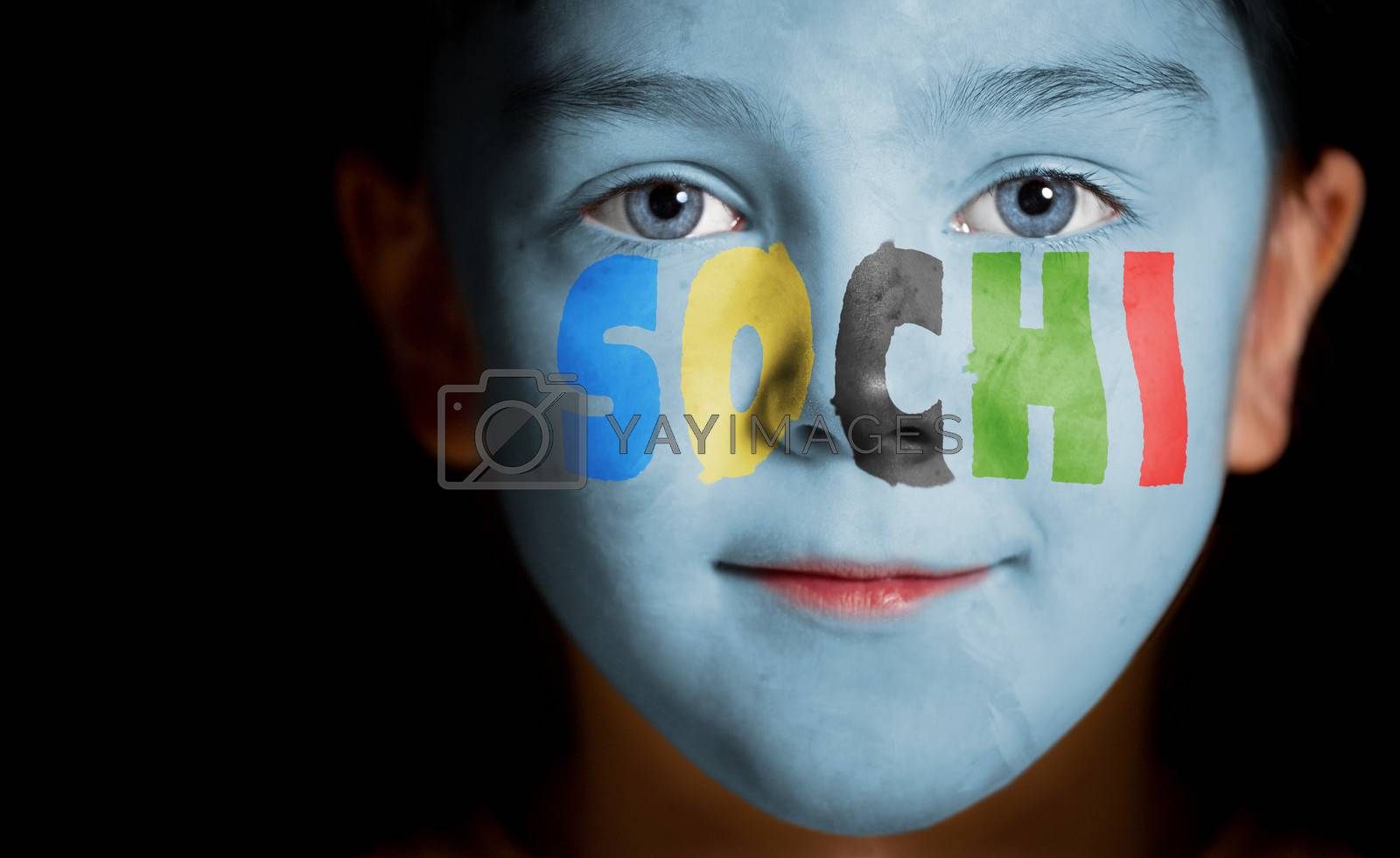 Royalty free image of Child face with painted text Sochi by TpaBMa