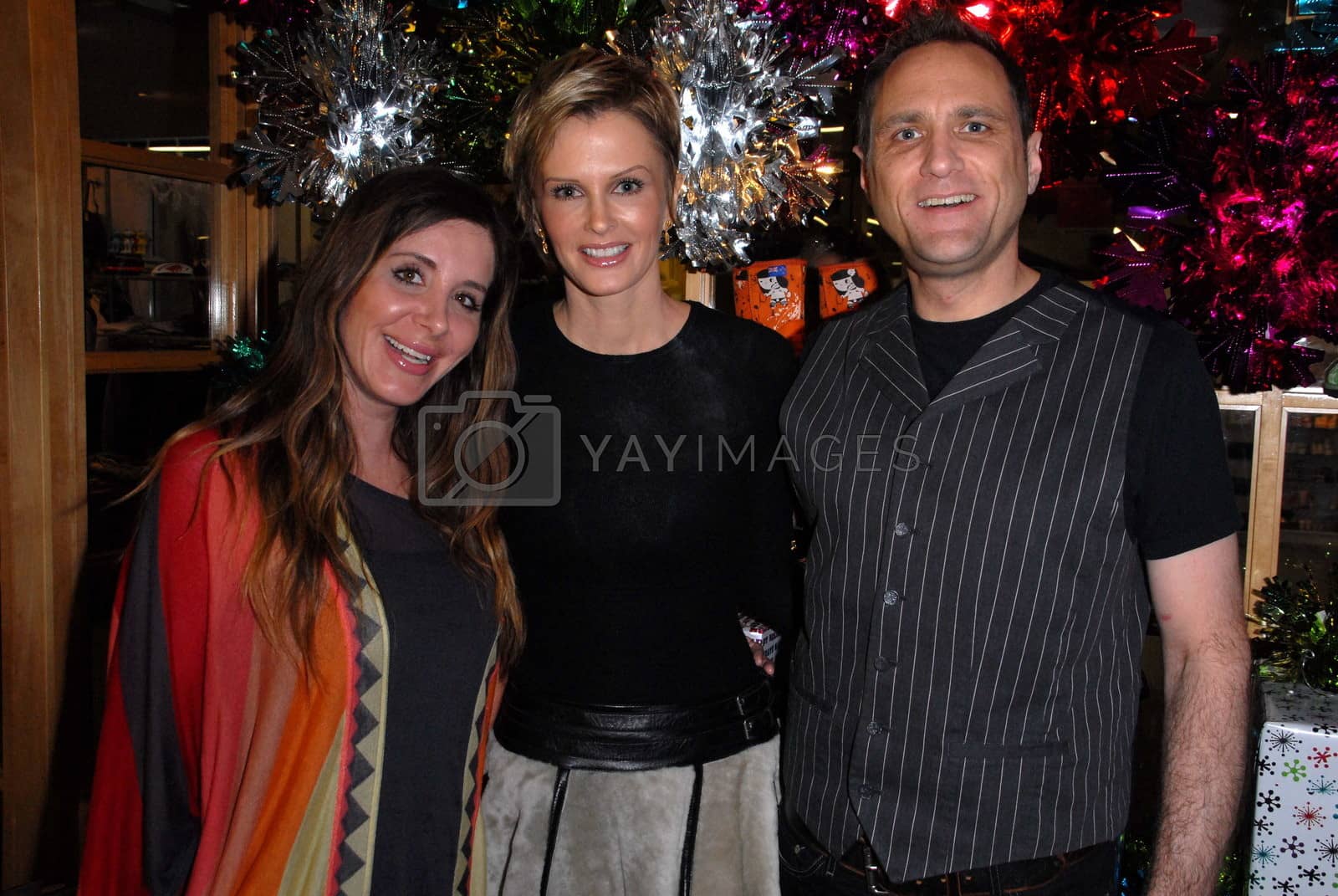 Royalty free image of Kylie Bax and friends at the launch of Kylie Bax and Spiros Poros' Moro Moro Kids Boot Collection at Ron Robinson Lifesize, Fred Segal, Santa Monica, CA. 12-11-10/ImageCollect by ImageCollect