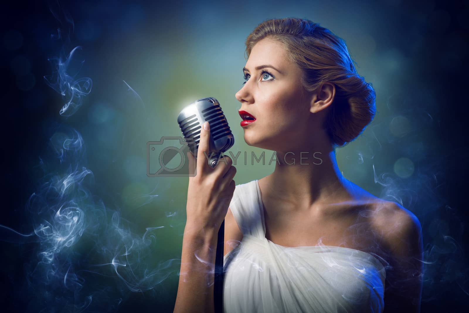Royalty free image of attractive female singer with microphone by adam121