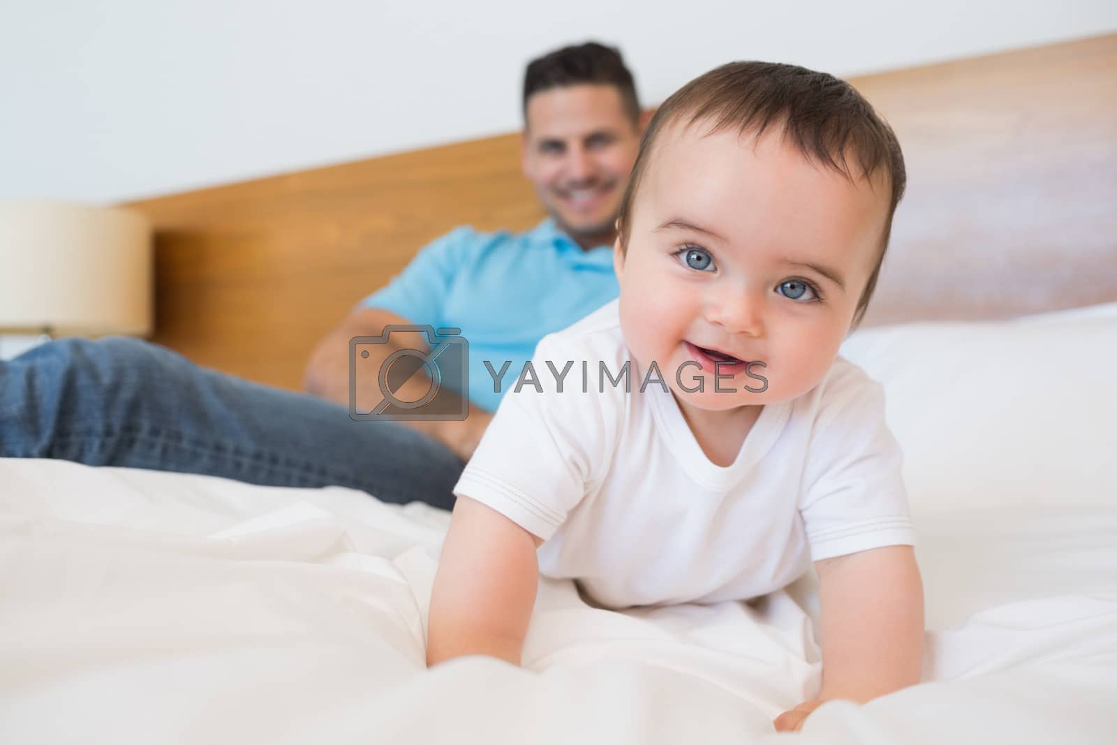 Royalty free image of Adorable baby boy on bed by Wavebreakmedia