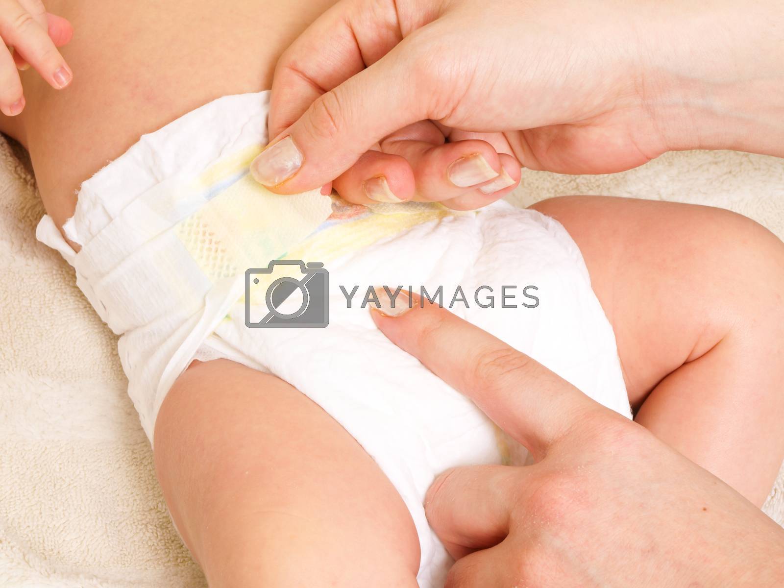 Royalty free image of Diaper change by Arvebettum