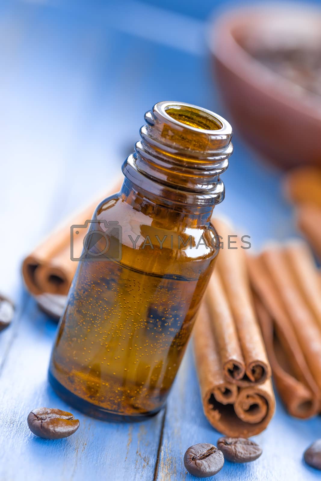Royalty free image of Cinnamon oil by yelenayemchuk