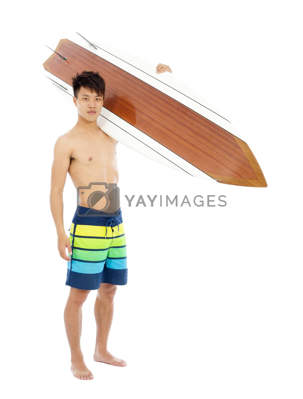 Royalty free image of sunny surfer put surfboard on the shoulder by tomwang
