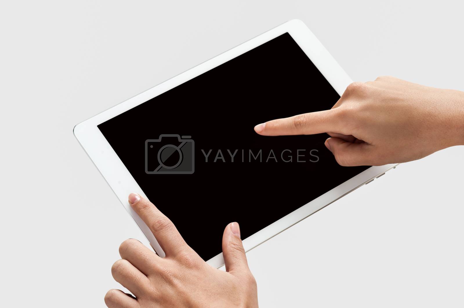 Royalty free image of Finger being pointed on tablet screen by stockyimages