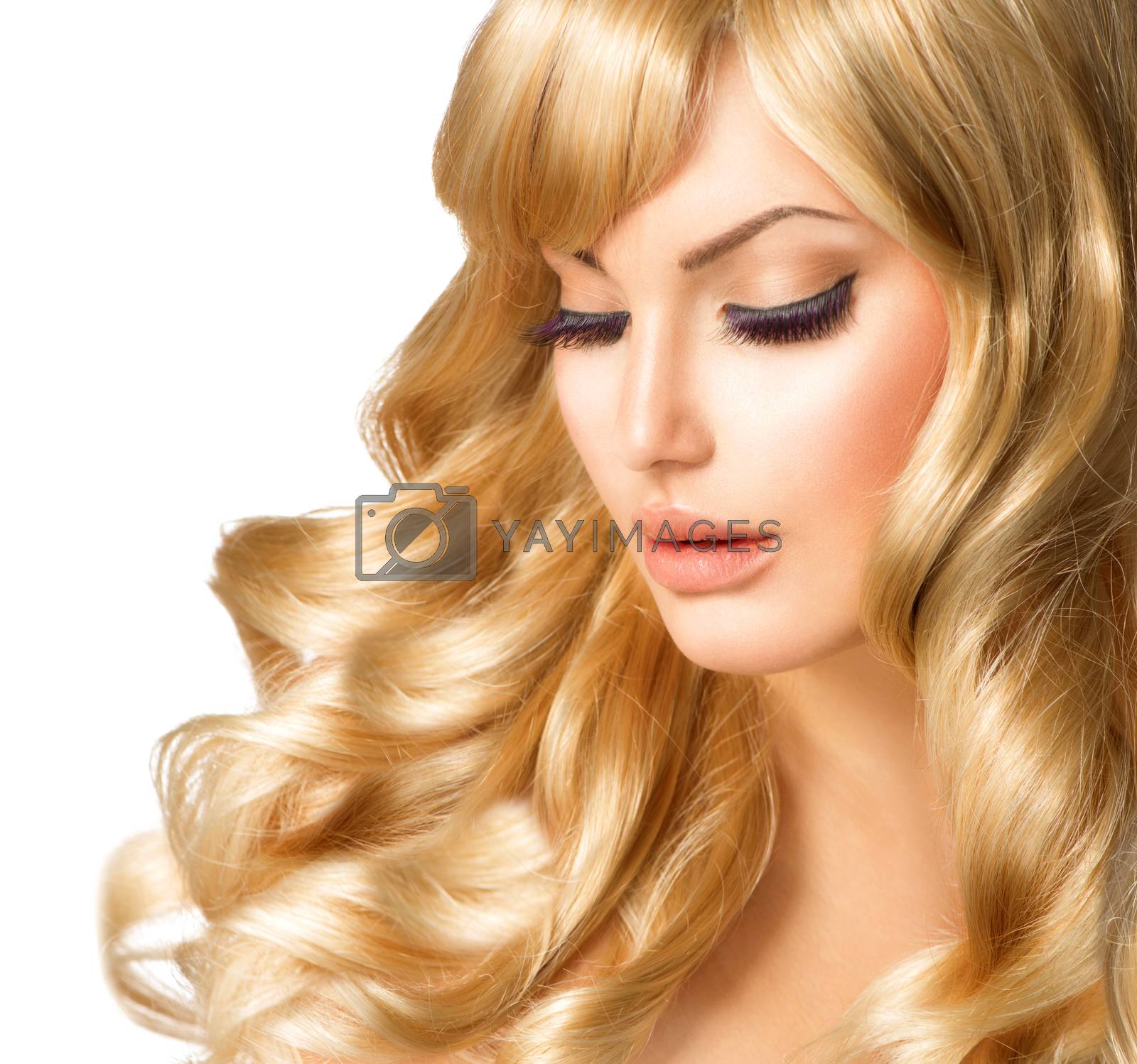 Royalty free image of Blonde Woman Portrait. Beautiful girl with long curly blond hair by SubbotinaA