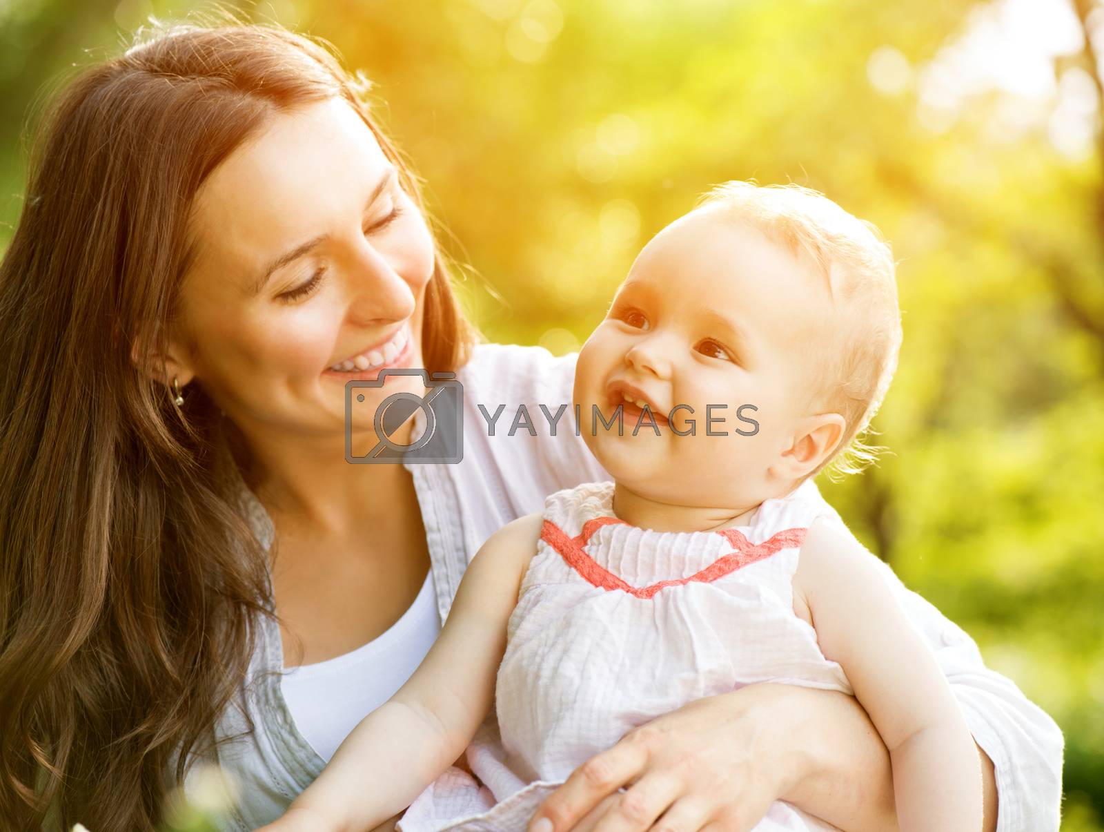 Royalty free image of Beautiful Mother And Baby outdoors. Nature by SubbotinaA