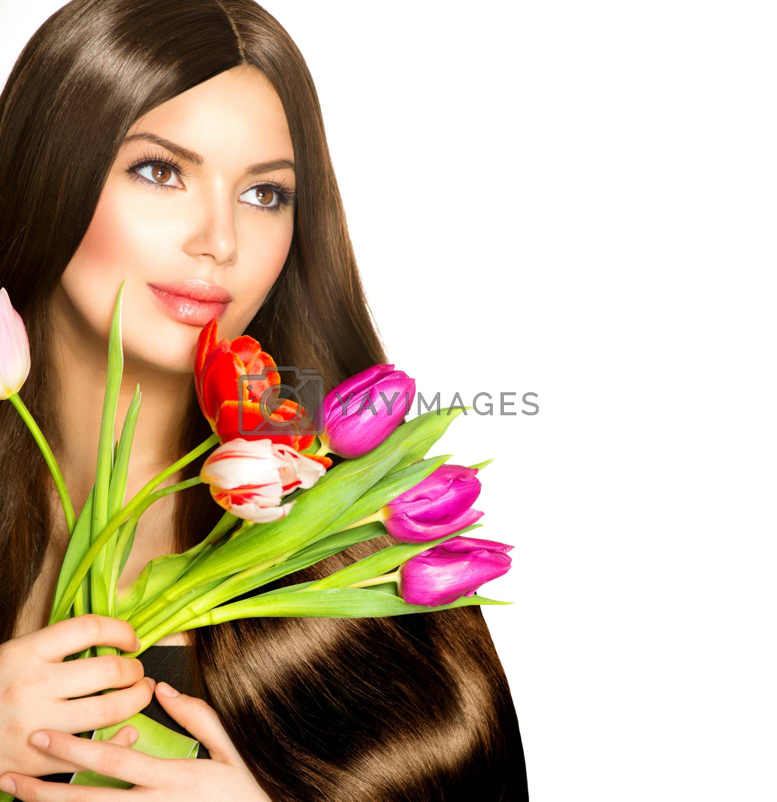 Royalty free image of Beauty Woman with Spring Bouquet of Tulip Flowers by SubbotinaA