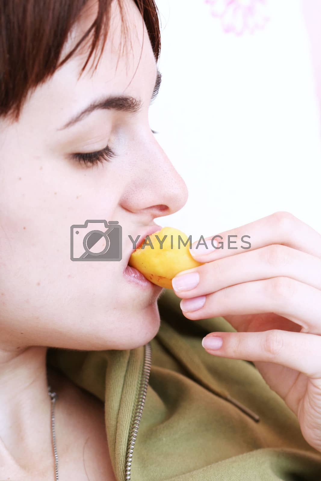 Royalty free image of Women with apricot  by arosoft