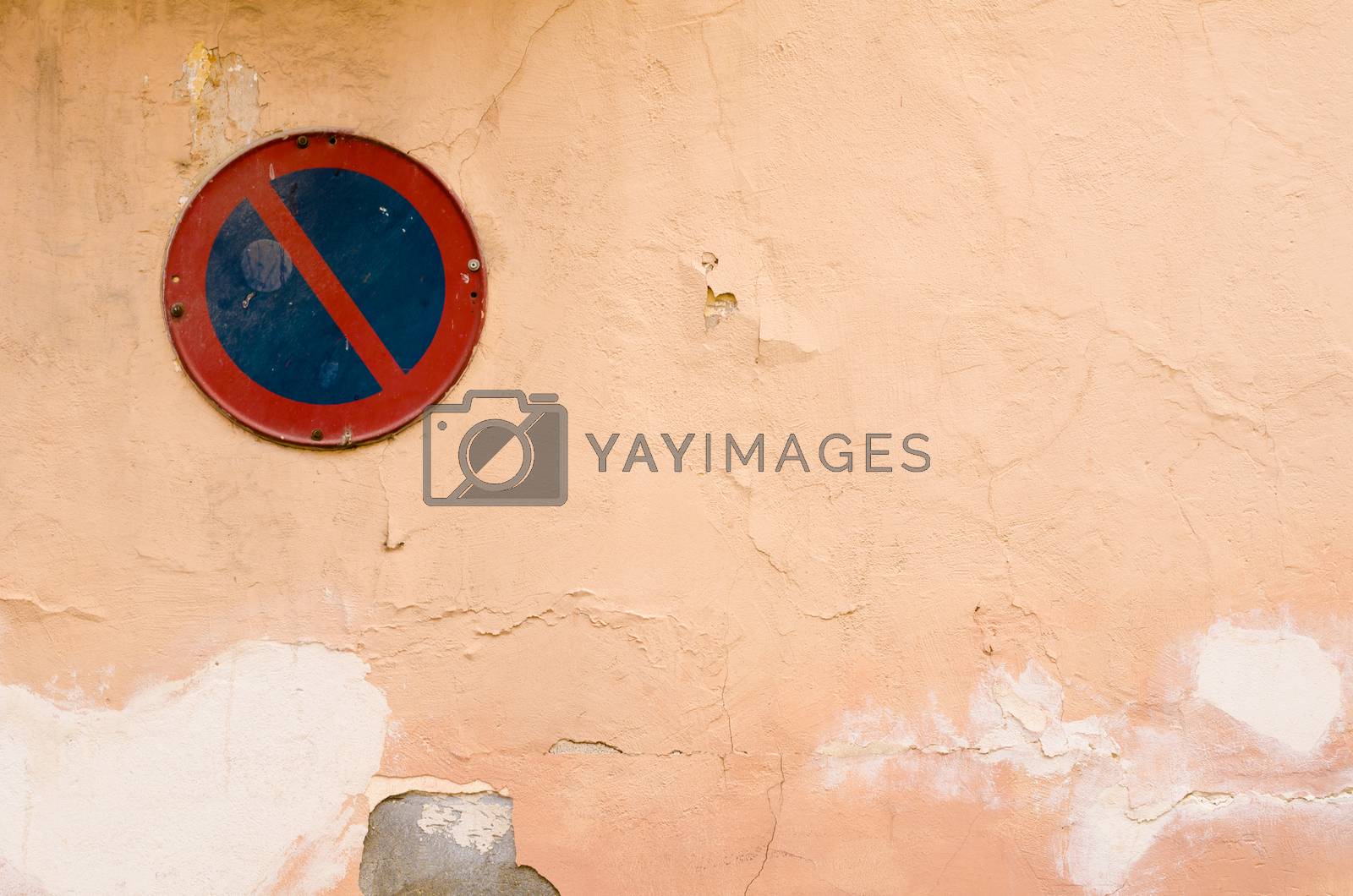 Royalty free image of Old wall and sign by hemeroskopion