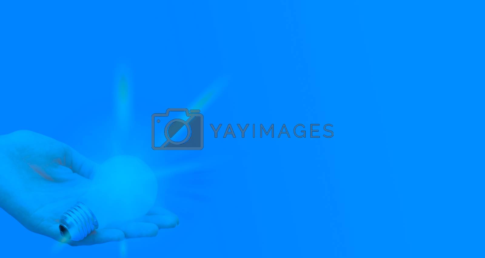 Royalty free image of Background with lit lightbulb by arosoft