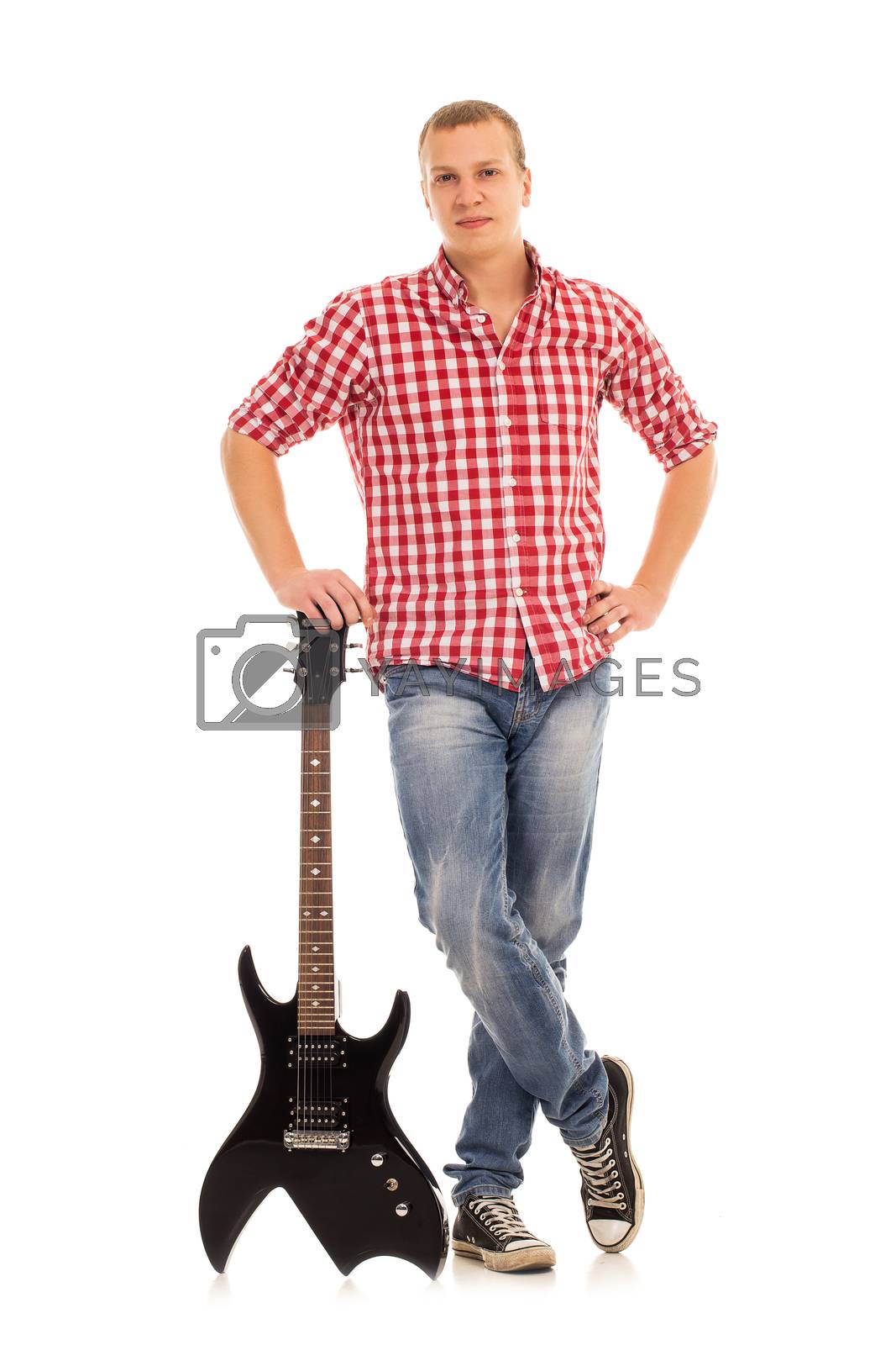 Royalty free image of Young musician with a guitar by rufatjumali
