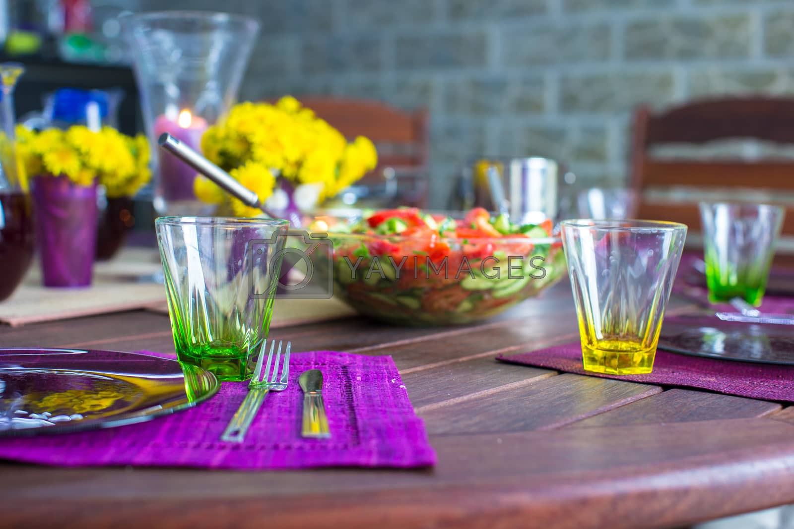 Royalty free image of Closeup of beautiful color tableware for decorated table by travnikovstudio