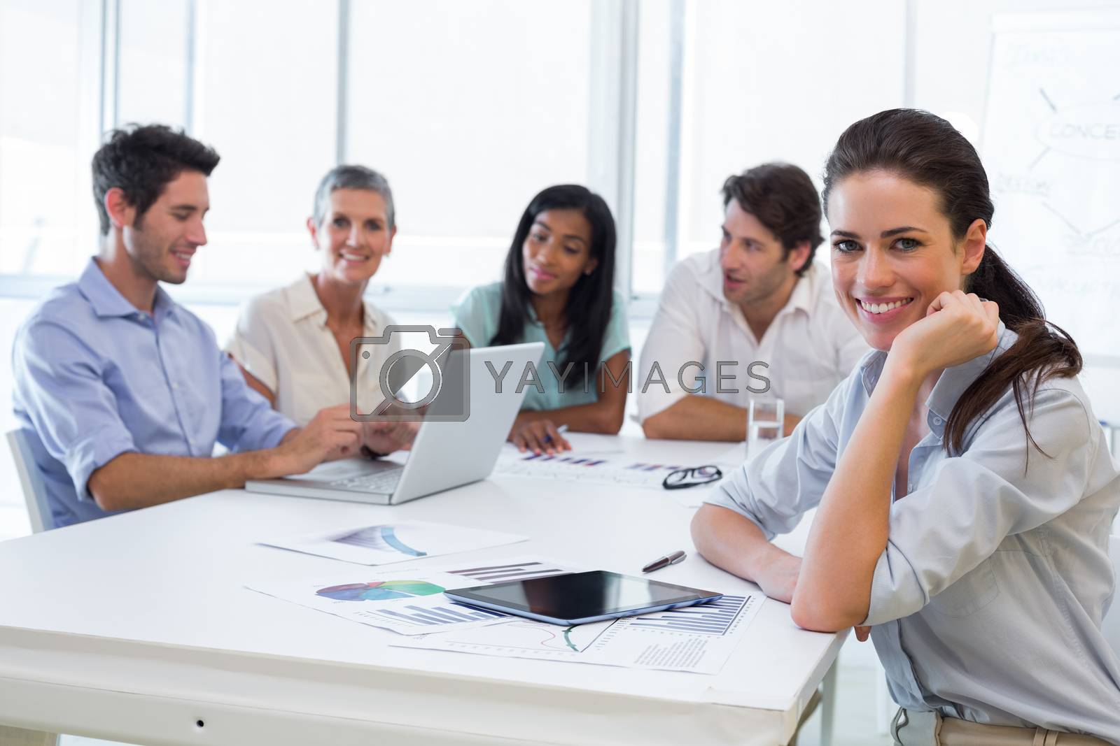 Royalty free image of Attractive businesswoman smiling in the workplace by Wavebreakmedia