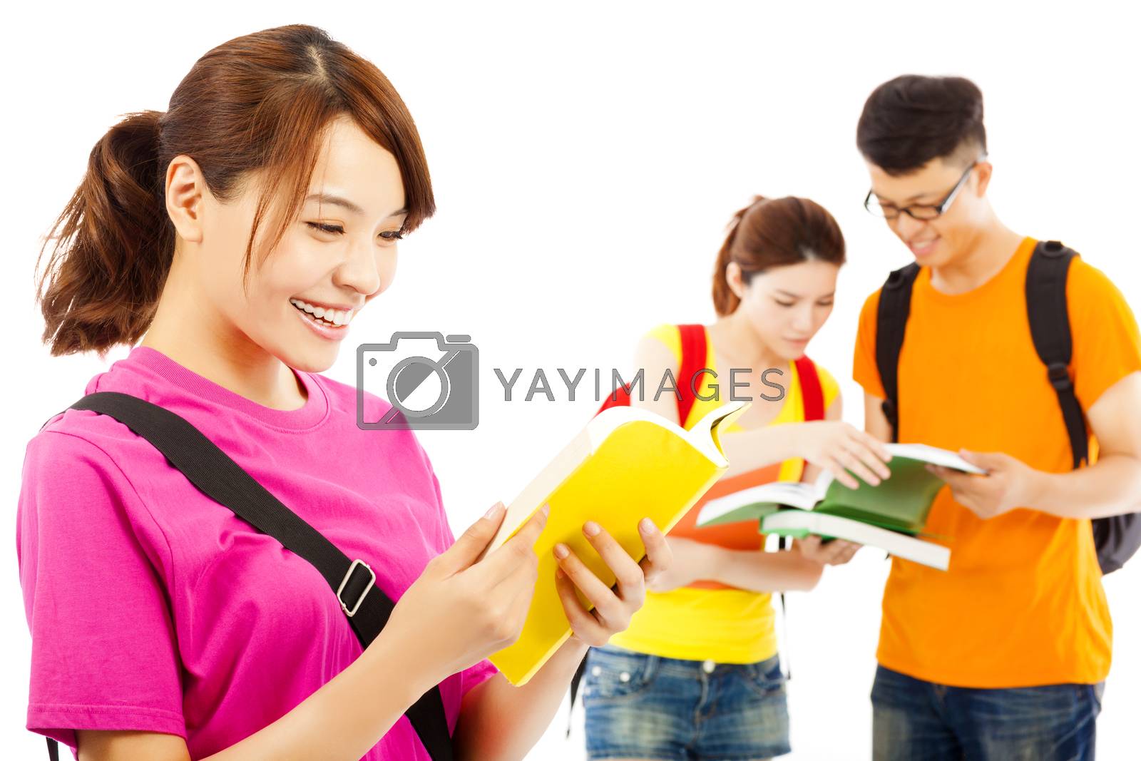 Royalty free image of young student read a book with classmates by tomwang