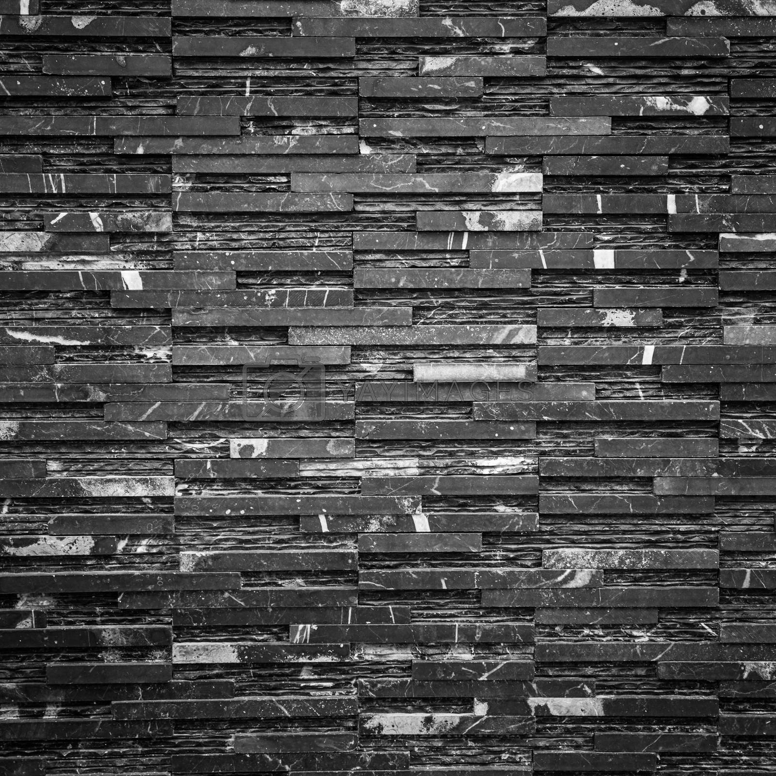 Royalty free image of Black brick wall by witthaya