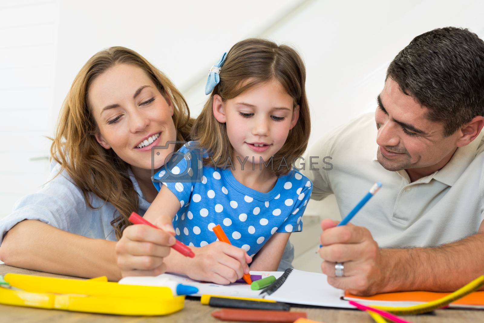 Royalty free image of Family coloring together by Wavebreakmedia
