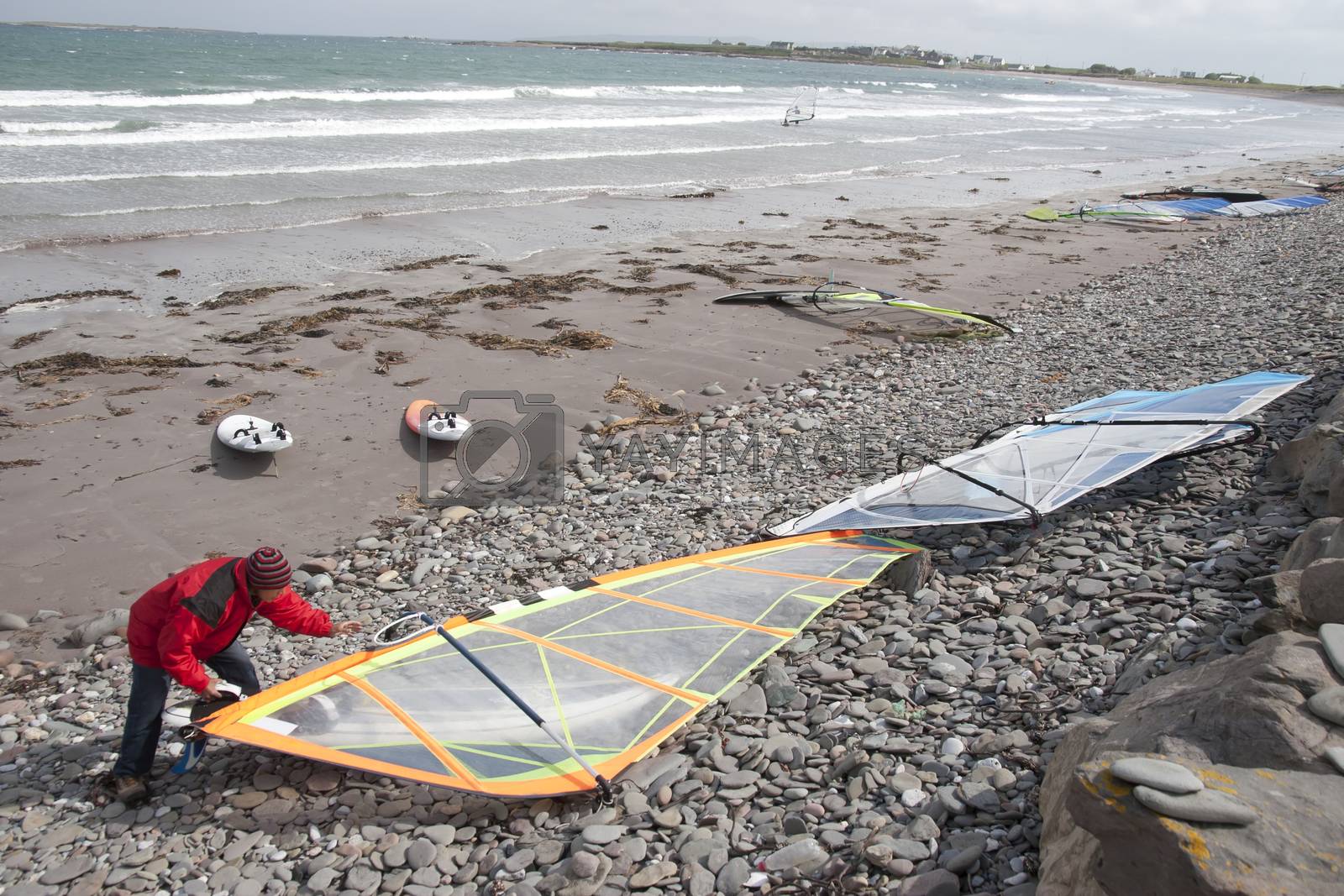 Royalty free image of Atlantic windsurfer getting ready by morrbyte