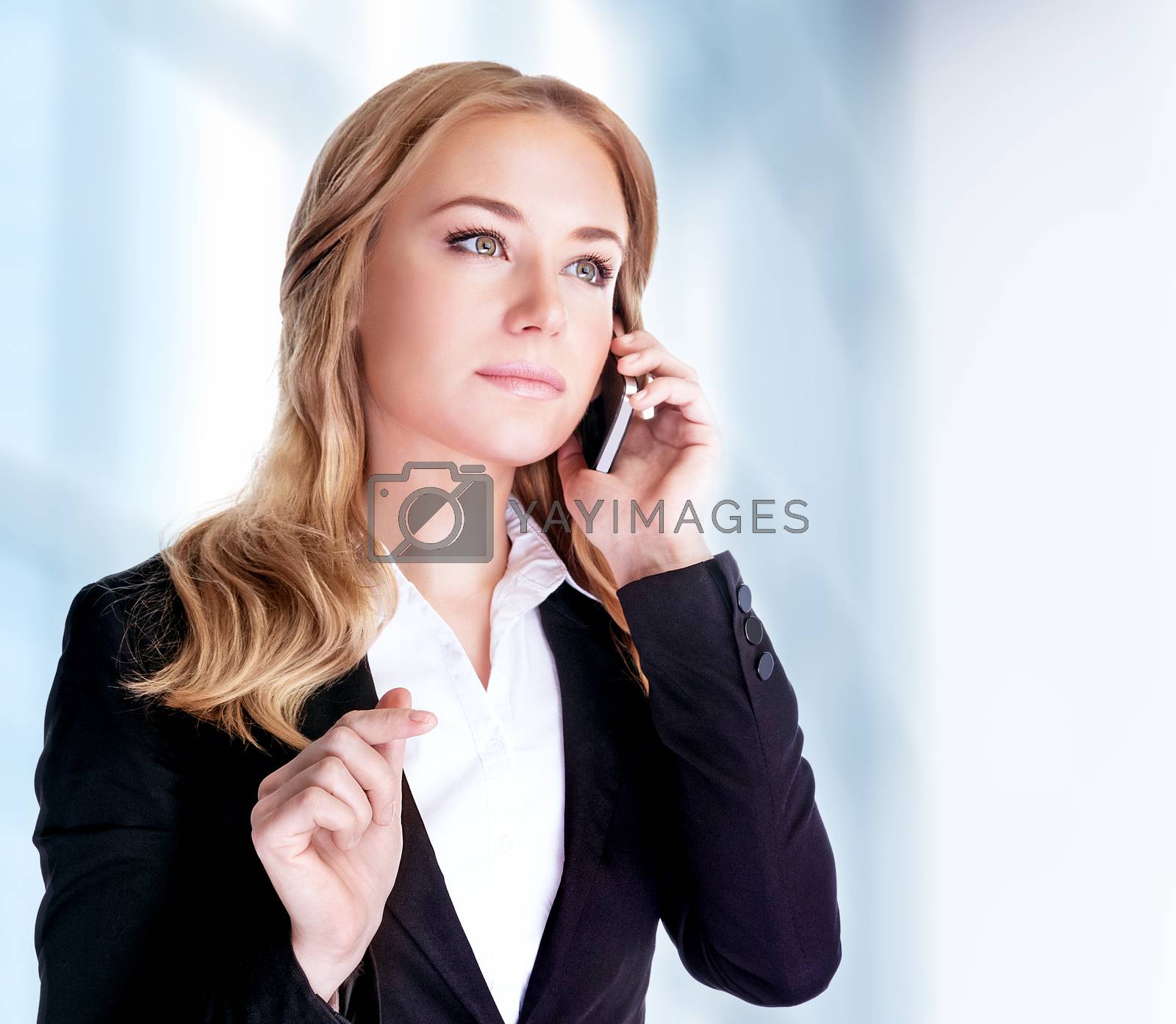Royalty free image of Business woman talking on phone by Anna_Omelchenko