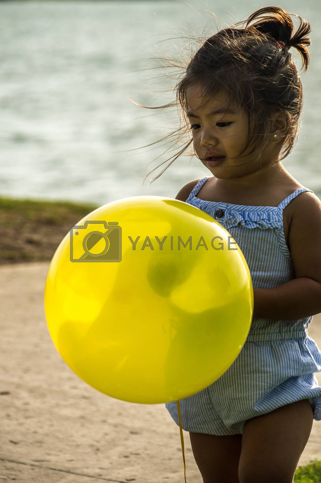 Royalty free image of Little Girl With Balloon by tim_rones