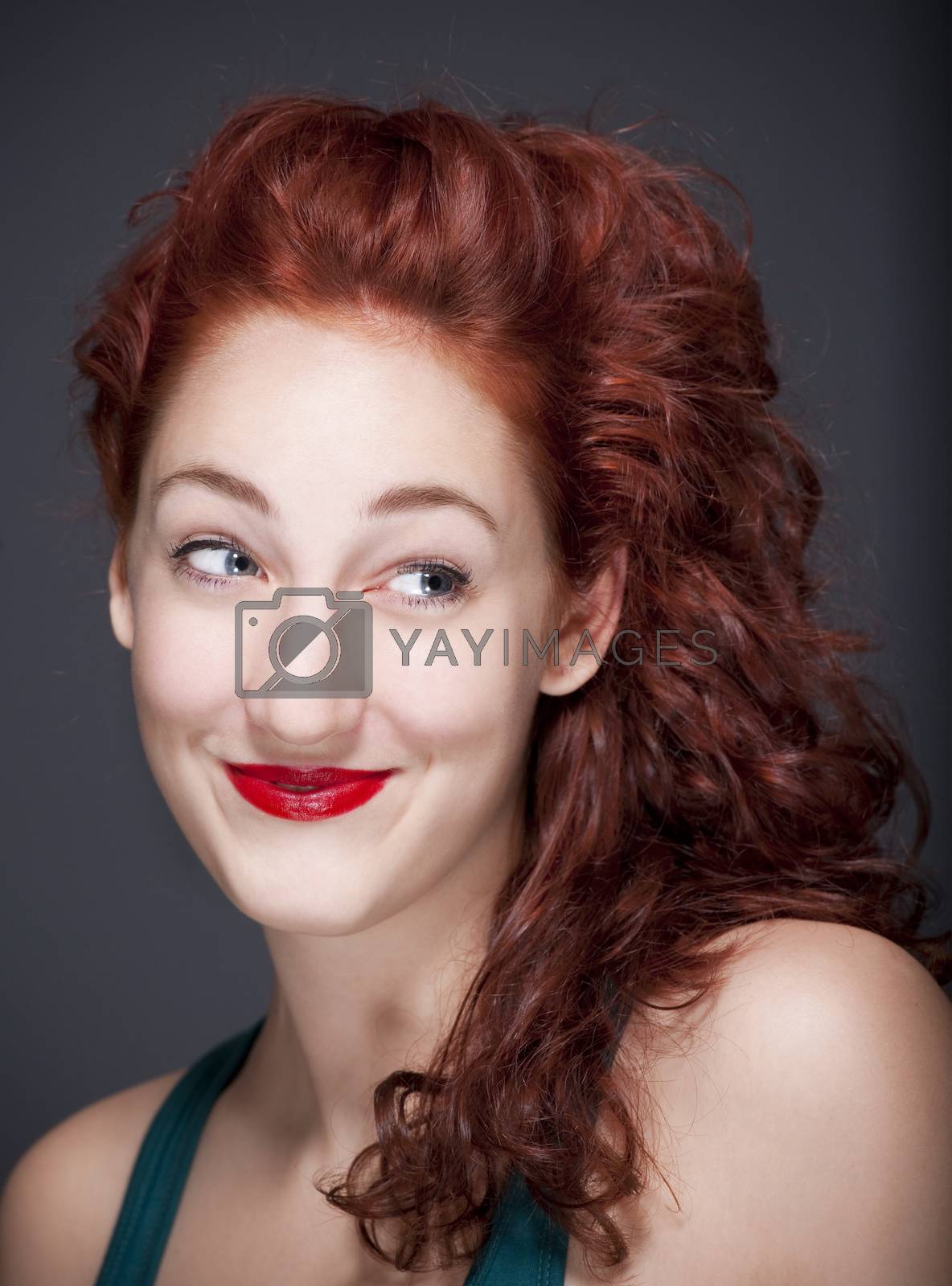 Royalty free image of girl with red hair by courtyardpix