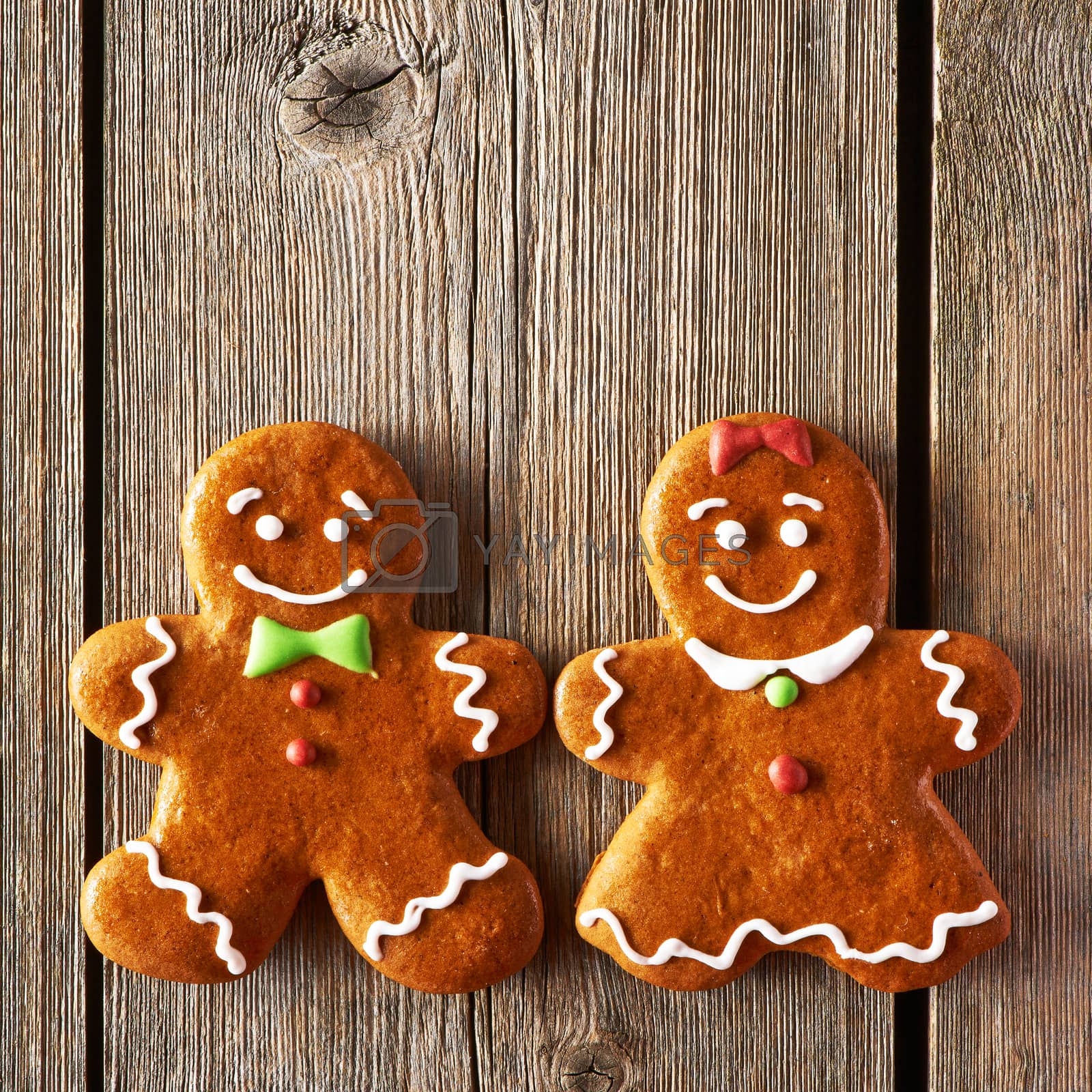 Royalty free image of Christmas homemade gingerbread couple cookies by haveseen