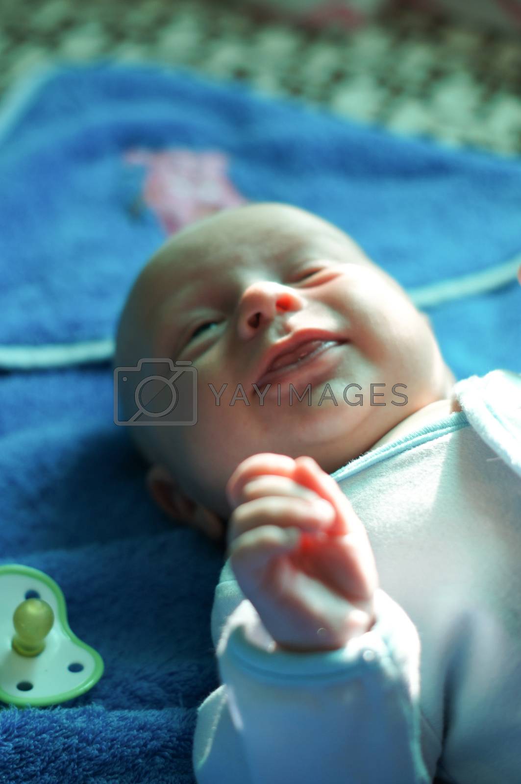 Royalty free image of A charming little baby by Viktoha