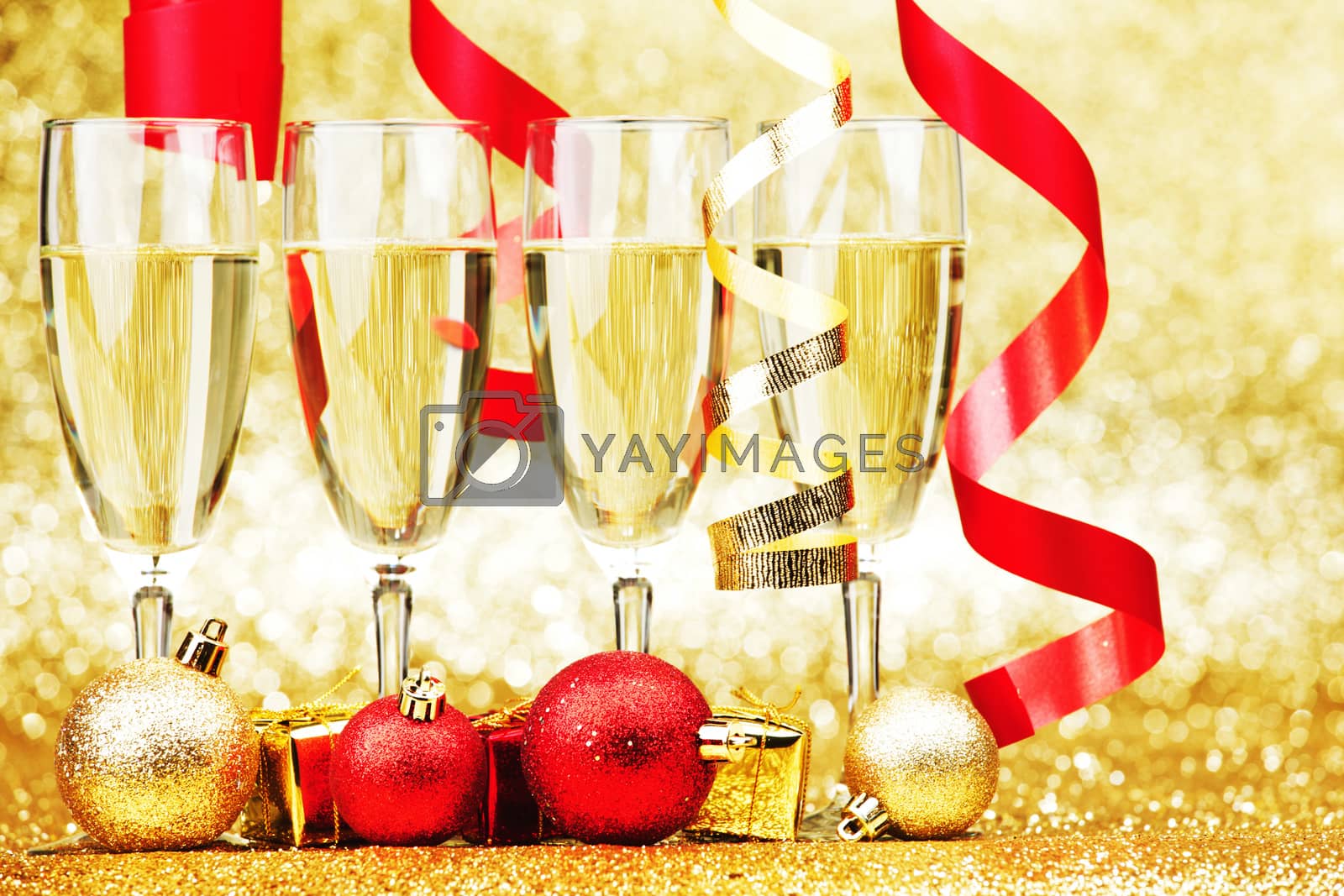 Royalty free image of Champagne and ribbons by Yellowj