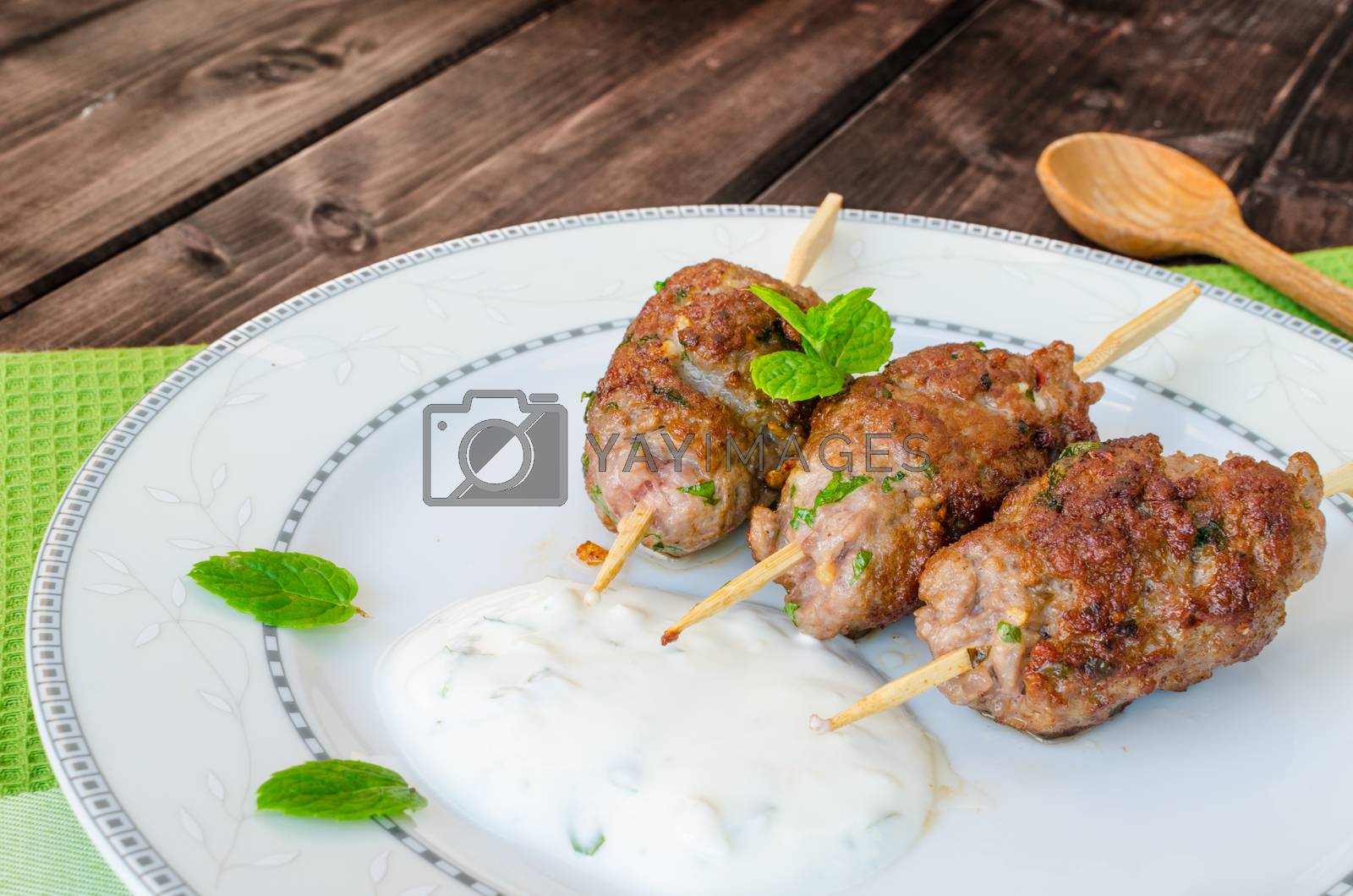 Royalty free image of Beef kebab with with couscous by Peteer
