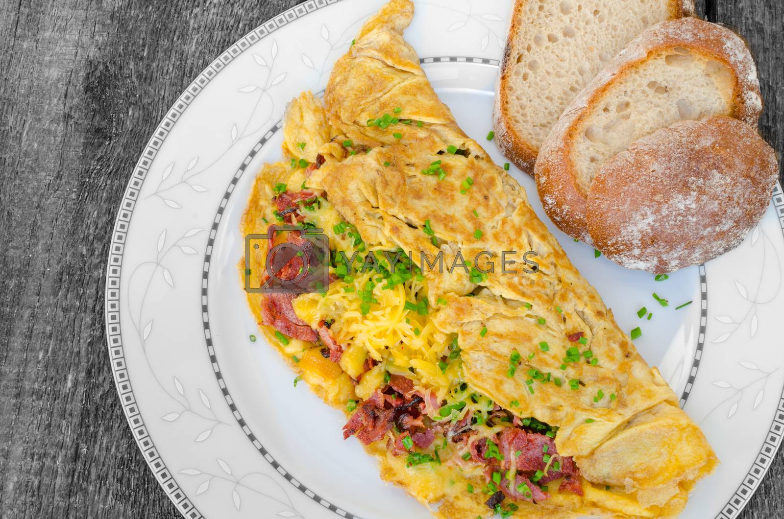 Royalty free image of Omelet with bacon and cheese by Peteer