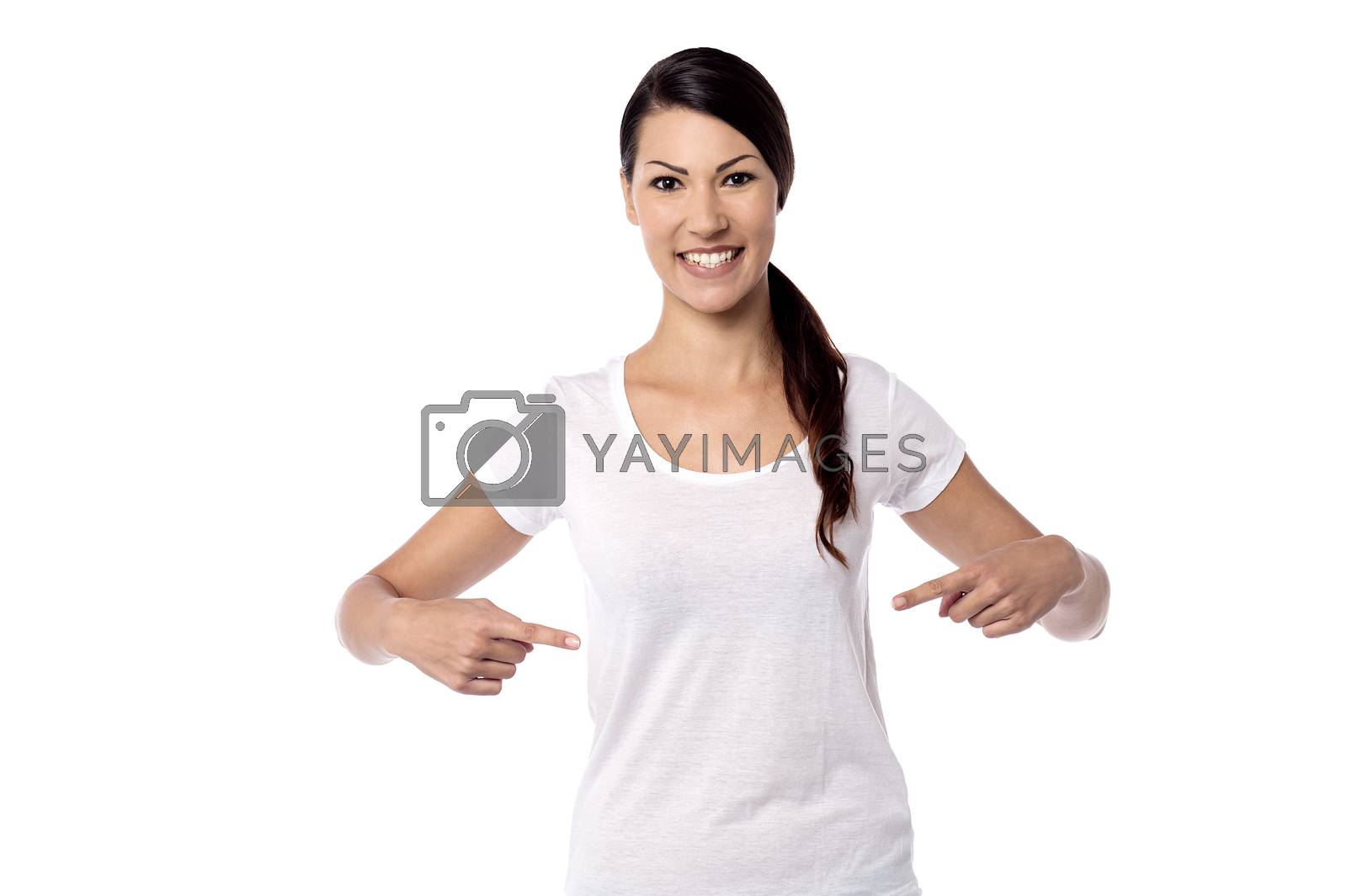Royalty free image of Pretty  woman pointing her stomach by stockyimages