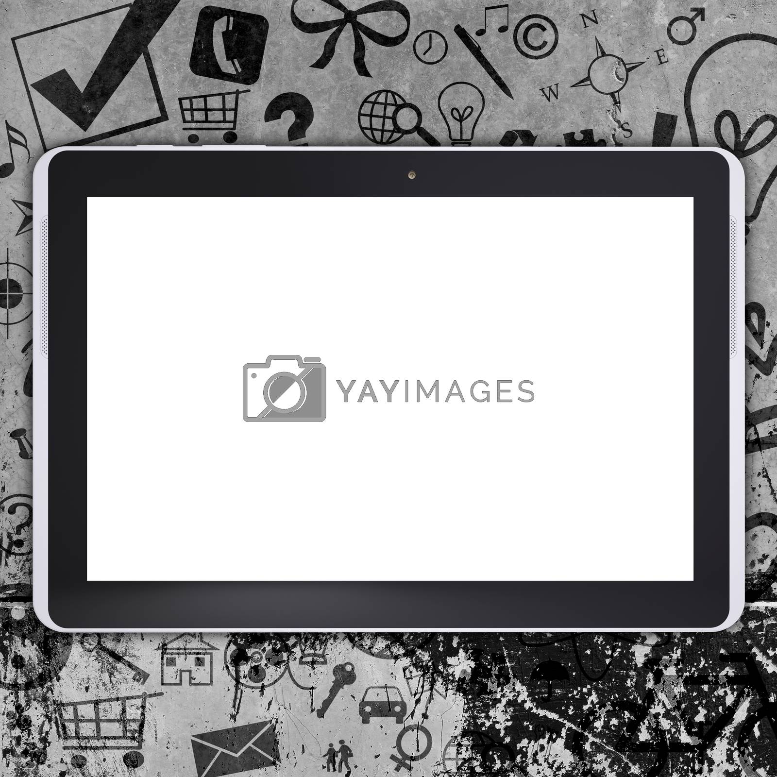 Royalty free image of Tablet pc on concrete floor with various social icons by cherezoff
