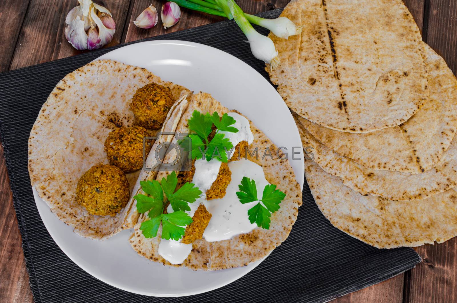 Royalty free image of Chickpea falafel with lebanese bread by Peteer
