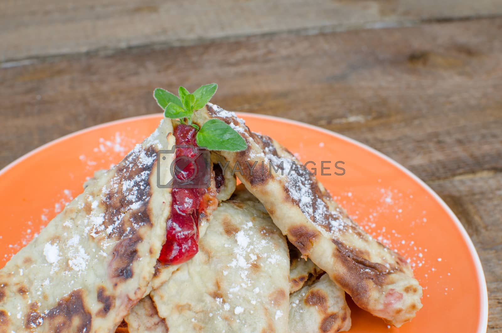 Royalty free image of Baked pancakes with jam by Peteer