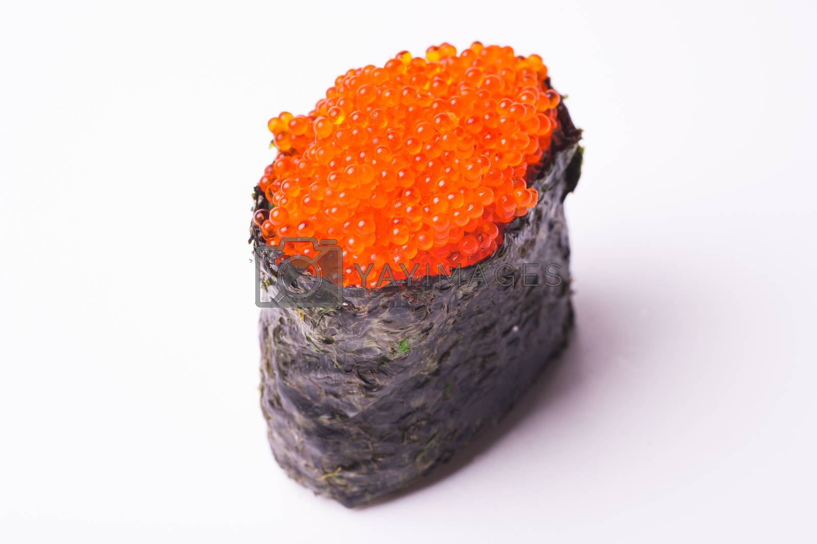 Royalty free image of flying fish caviar sushi on white background  by fesenko
