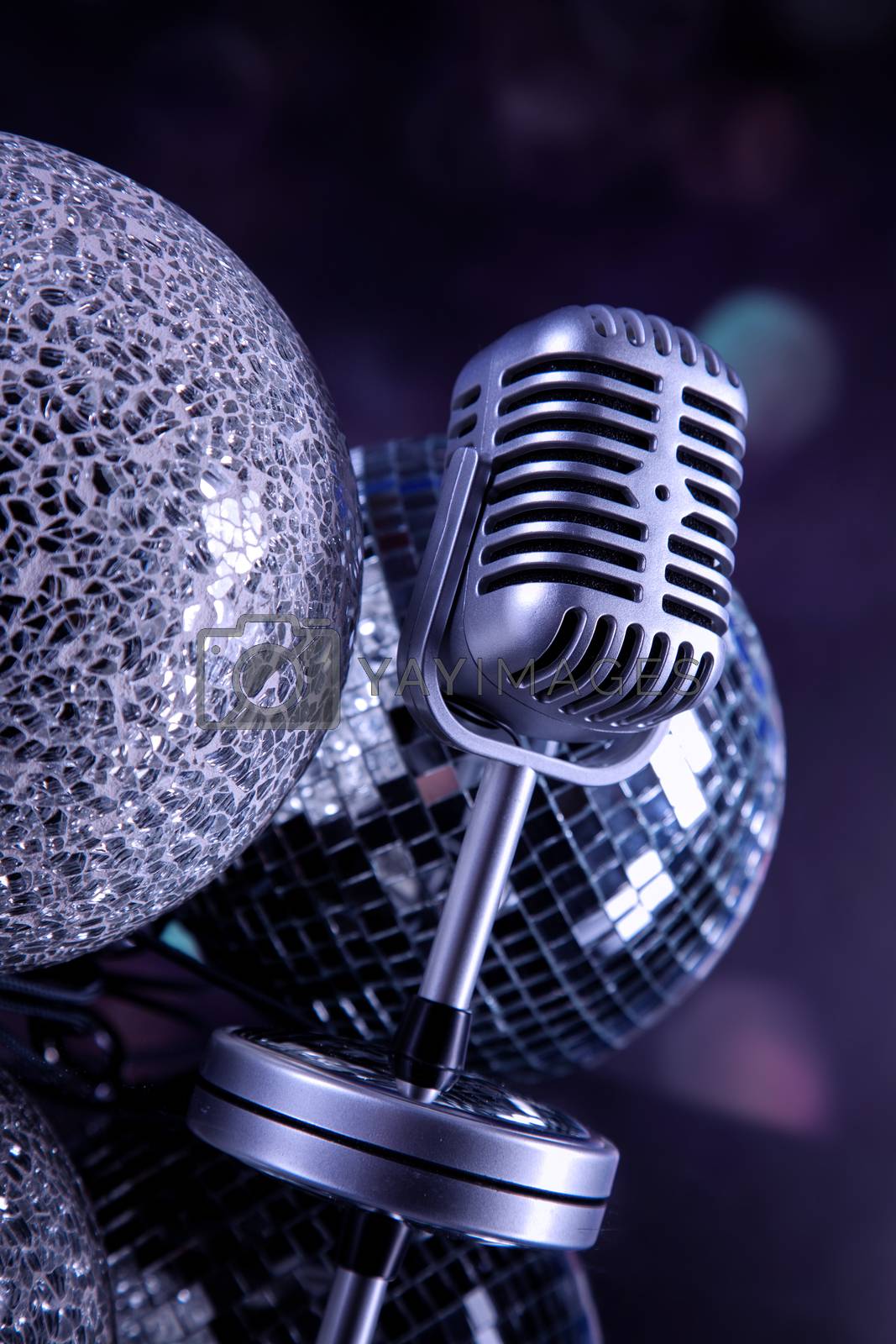 Royalty free image of professional silver microphone by fikmik