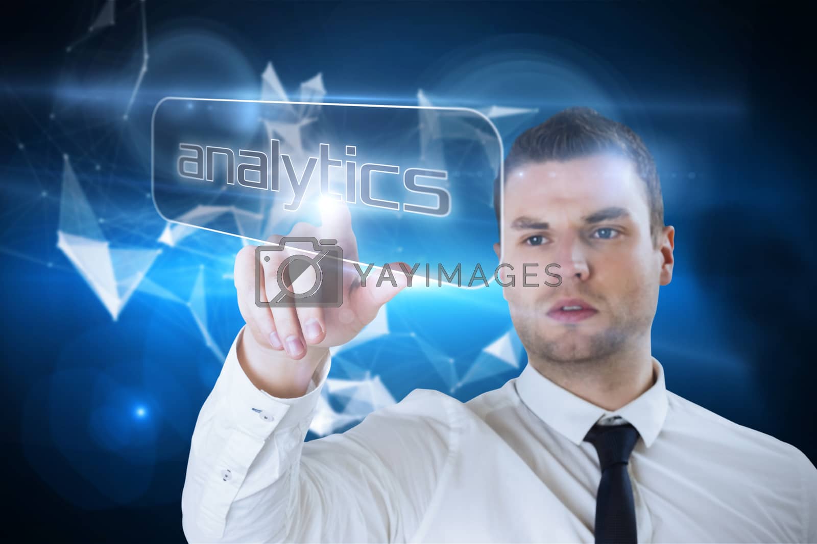 Royalty free image of Businessman pointing to word analytics by Wavebreakmedia