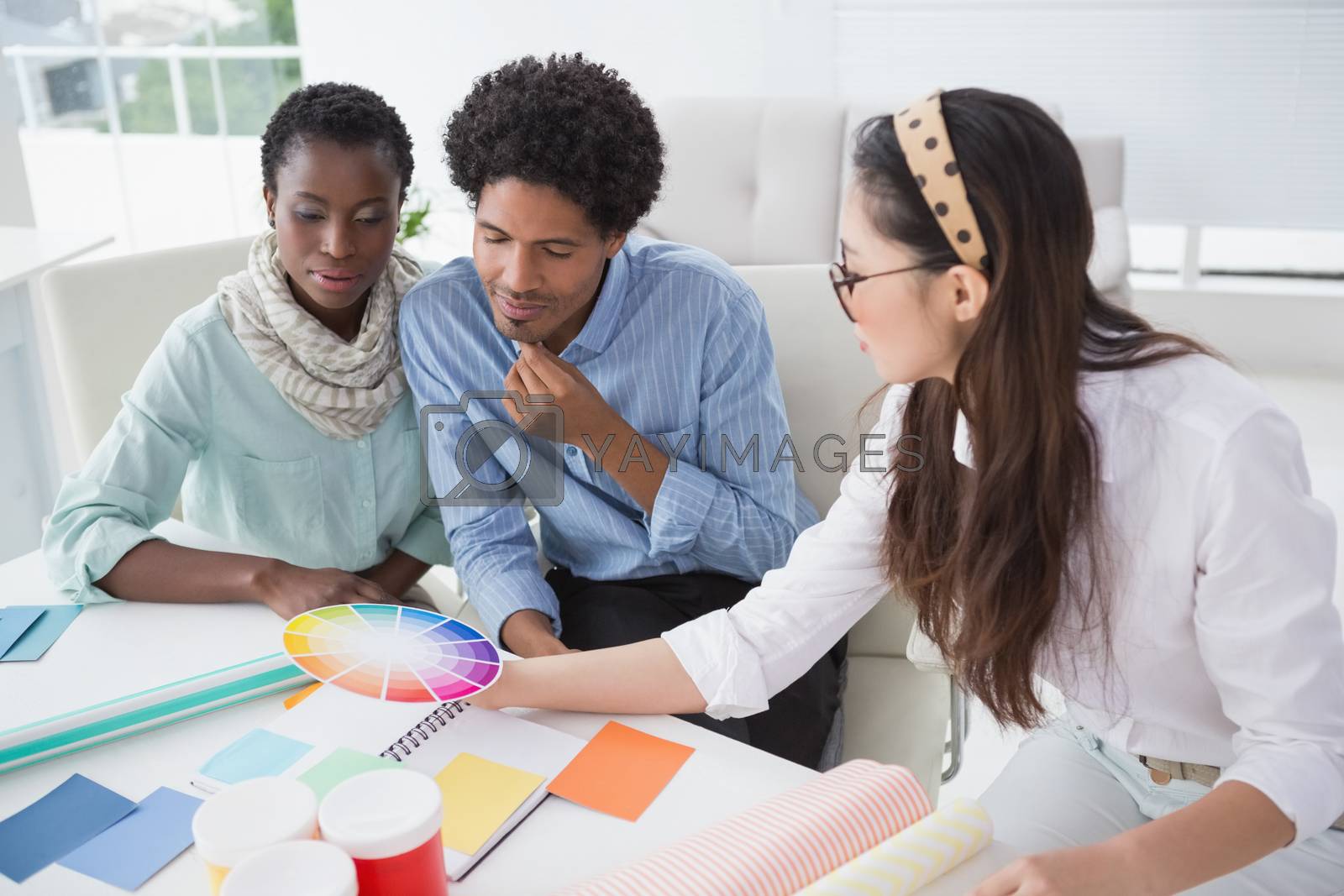 Royalty free image of Interior designer speaking with clients by Wavebreakmedia