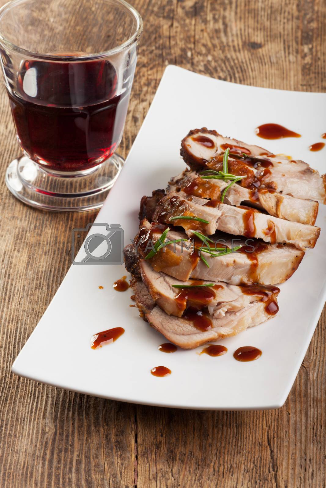 Royalty free image of roasted pork dish  by bernjuer